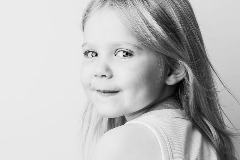 Black and white personality portrait of a child photographed in Cleveland